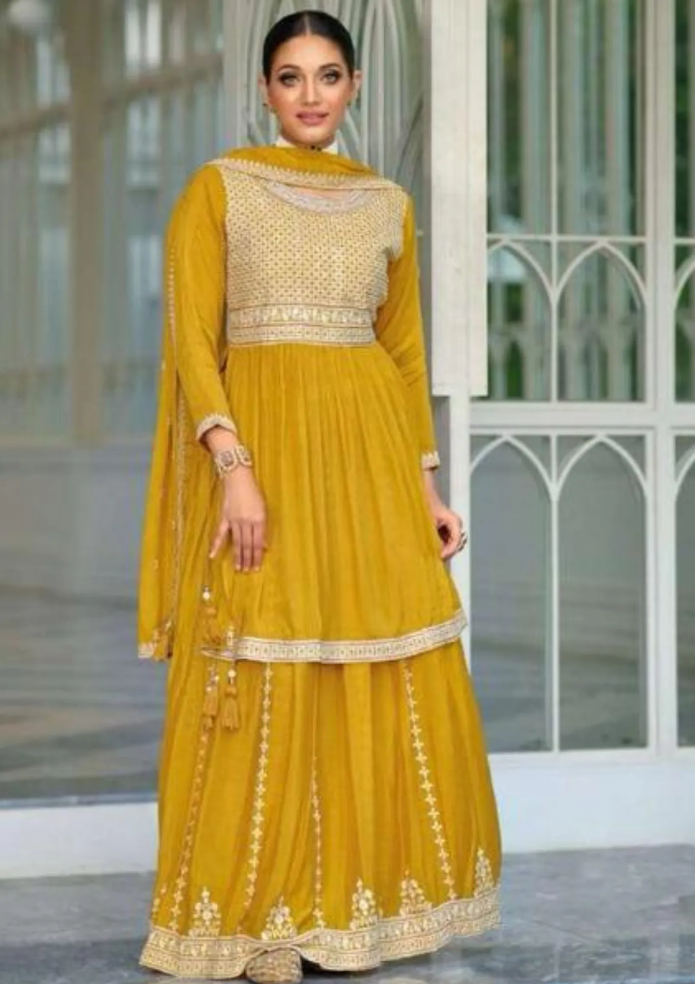 Attractive Yellow Color Front And Back Embroidery Designer Kurti