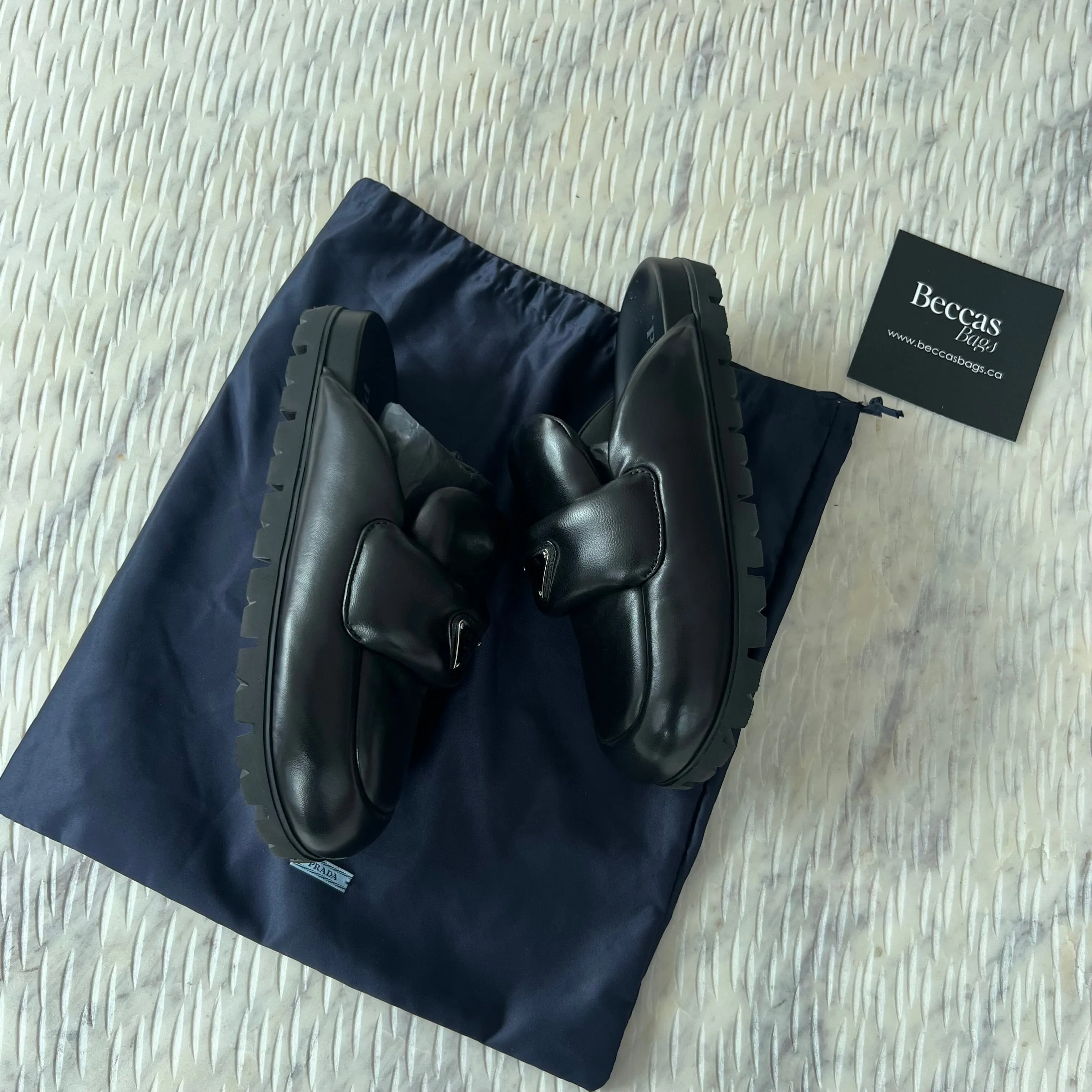 Prada Soft padded nappa leather sabots